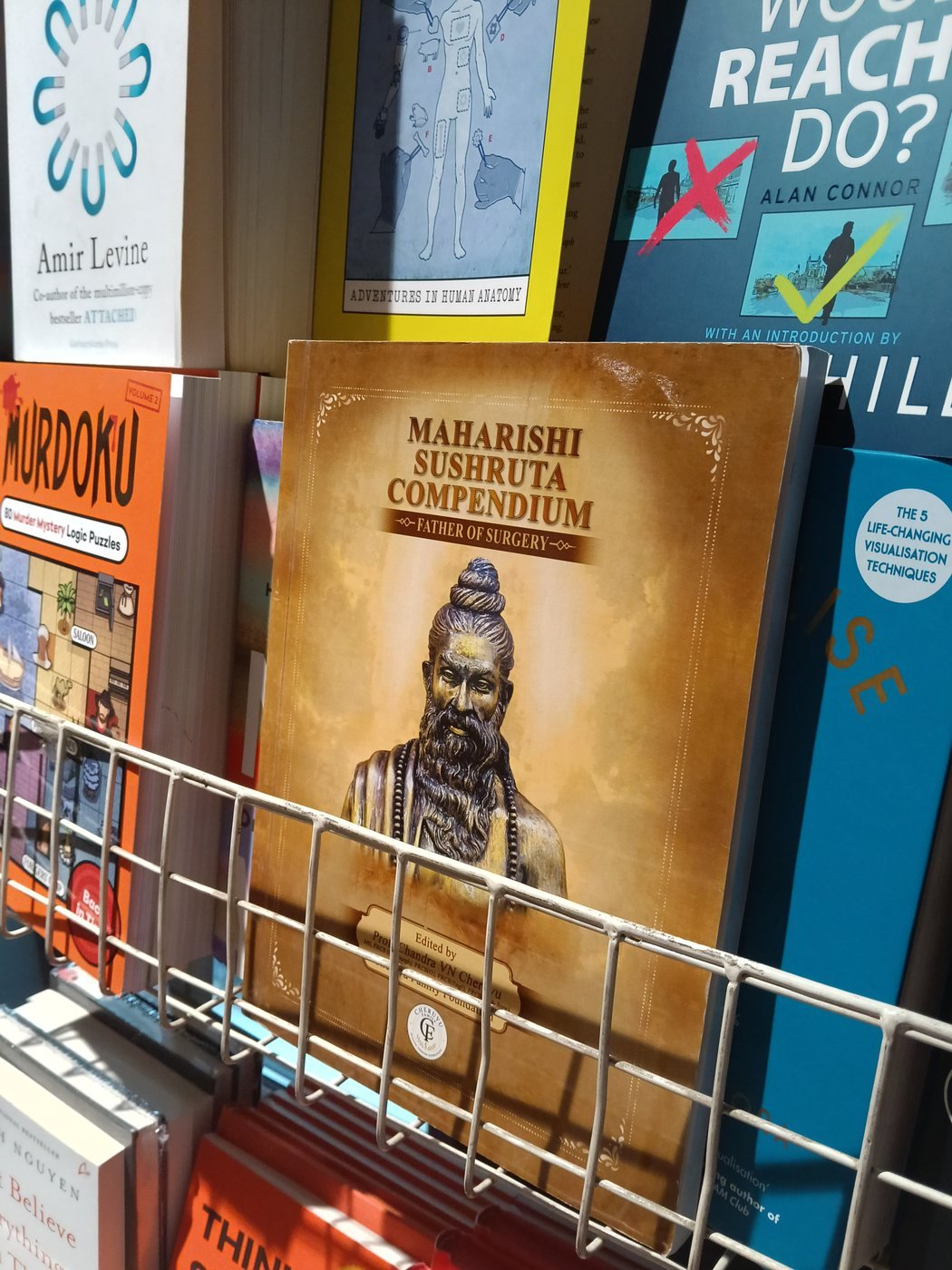 Maharishi Sushruta Compendium on a shelf at Higginbothams, Chennai