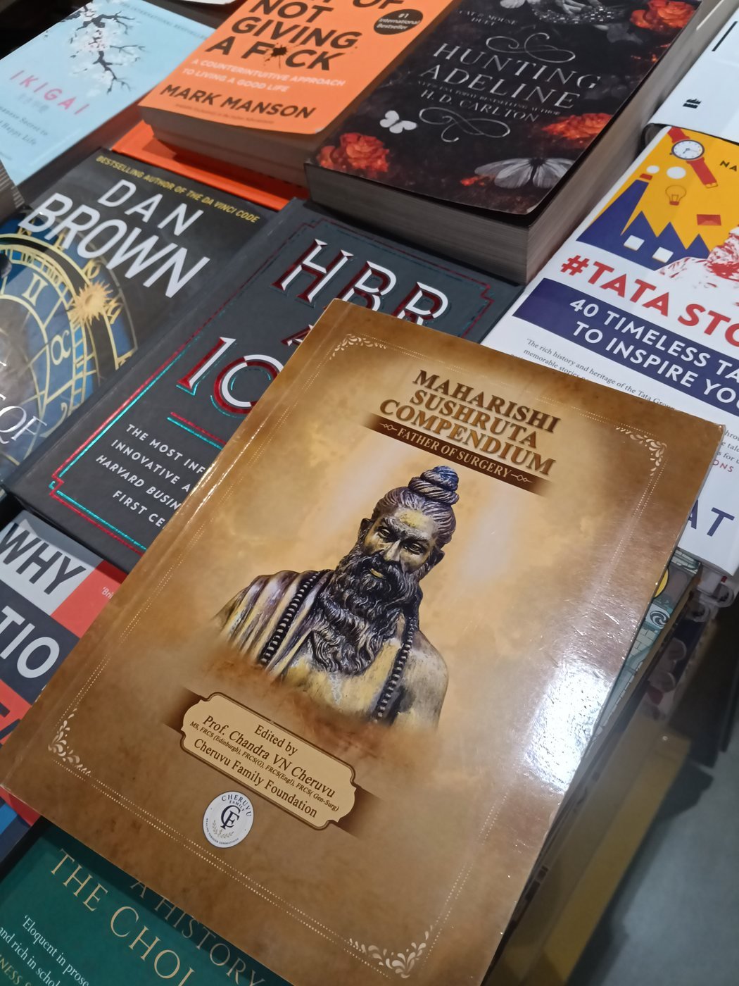 Maharishi Sushruta Compendium on a display table at Higginbothams, VR Mall, Chennai